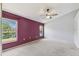 The main bedroom has large windows with a great outdoor view at 4604 9Th E Ave, Bradenton, FL 34208
