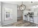 The dining room has modern lighting and sleek countertops at 4604 9Th E Ave, Bradenton, FL 34208