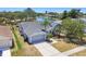 Charming single-Gathering home boasts a well-manicured lawn, two-car garage, and beautiful waterfront view at 4604 9Th E Ave, Bradenton, FL 34208