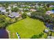 Aerial view showcases a large green space with a water view, enhancing the natural beauty of the community at 4604 9Th E Ave, Bradenton, FL 34208