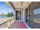 Screened patio area offering views of backyard, pond and blue skies at 4604 9Th E Ave, Bradenton, FL 34208