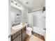 Bathroom features modern fixtures, granite vanity, and a shower and tub combo at 4722 Lindever Ln, Palmetto, FL 34221