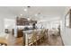 Open kitchen boasts granite countertops, stainless steel appliances, a center island, and seamless flow to the living space at 4722 Lindever Ln, Palmetto, FL 34221