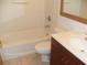 Bathroom features a tub with shower, toilet, and vanity with sink at 4941 25Th W St # 101, Bradenton, FL 34207