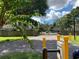 Gated community entrance with grass and foliage at 4941 25Th W St # 101, Bradenton, FL 34207