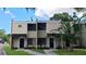 Inviting townhouse exterior featuring well-manicured landscaping and a serene, neighborhood feel at 4941 25Th W St # 101, Bradenton, FL 34207