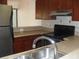 Functional kitchen featuring stainless steel appliances, ample counter space, and tiled backsplash at 4941 25Th W St # 101, Bradenton, FL 34207