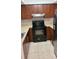 The Kitchen has stainless steel appliances, tiled floors, and dark cabinets at 4941 25Th W St # 101, Bradenton, FL 34207