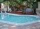 Community pool features a pergola with hot tub at 4941 25Th W St # 101, Bradenton, FL 34207