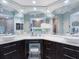 Bathroom with double vanity sinks and large mirrors at 521 Habitat Blvd, Osprey, FL 34229