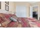 Comfortable bedroom showcasing a decorative bedspread and neutral wall color at 6951 Scrub Jay Dr, Sarasota, FL 34241
