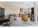 Bonus room with a desk for work, a seating area for relaxation, and lots of extra space at 6951 Scrub Jay Dr, Sarasota, FL 34241