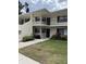 Charming condo building with well-kept landscaping and inviting walkways in a desirable neighborhood at 7050 Fairway Bend Ln # 167, Sarasota, FL 34243