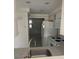 Efficient kitchen with ample counter space, white cabinets, and modern appliances at 7050 Fairway Bend Ln # 167, Sarasota, FL 34243