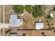 Aerial view of the house and large backyard with separate detached building at 7055 Kenwood Dr, North Port, FL 34287