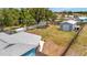 Expansive fenced backyard featuring a detached garage, offering ample space for outdoor activities at 7055 Kenwood Dr, North Port, FL 34287