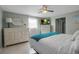 Comfortable bedroom featuring a plush bed, a TV, white dressers, and a peaceful, relaxing atmosphere at 709 84Th Nw St, Bradenton, FL 34209