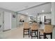 Living space offers bar seating, kitchen, living room, and dining area, all in an open concept layout at 709 84Th Nw St, Bradenton, FL 34209
