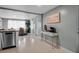 Open concept kitchen dining features a view of the dining table with seating for four and stainless appliances at 709 84Th Nw St, Bradenton, FL 34209