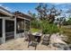 Outdoor patio featuring a modern fire pit table with seating, perfect for relaxing or entertaining guests at 709 84Th Nw St, Bradenton, FL 34209