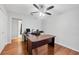 Home office with a large desk and plenty of workspace at 7374 Royal Birkdale Dr # 15D, Sarasota, FL 34238