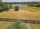 Backyard view of a large backyard with a privacy fence at 8121 Snowy Egret Pl, Bradenton, FL 34202