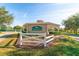 A welcoming entrance to Preserve Park with a charming sign and manicured landscaping at 8121 Snowy Egret Pl, Bradenton, FL 34202