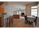 Open floor plan with kitchen, dining area, and living room at 8121 Snowy Egret Pl, Bradenton, FL 34202
