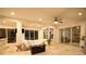 Spacious covered patio with comfortable seating and recessed lighting, ideal for relaxing and entertaining at 8121 Snowy Egret Pl, Bradenton, FL 34202