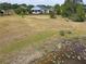 View of a backyard pond and home at 8121 Snowy Egret Pl, Bradenton, FL 34202