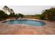 A beautiful private pool offers fun for everyone and the backyard is beautifully landscaped at 8121 Snowy Egret Pl, Bradenton, FL 34202