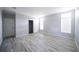 Spacious bedroom with lots of natural light from two windows and walk-in closet at 8226 Sweden Blvd, Punta Gorda, FL 33982