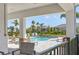 Relaxing view of the community pool and lounge area with lush landscaping and comfortable seating at 8545 Daybreak St, Sarasota, FL 34241