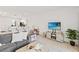 Open concept living room and kitchen area with modern furnishings at 8545 Daybreak St, Sarasota, FL 34241