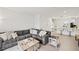 Spacious living room seamlessly connected to the open-concept kitchen at 8545 Daybreak St, Sarasota, FL 34241