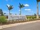 Turner Park at Skye Ranch entrance sign nestled in lush landscaping with open fields in the background at 8545 Daybreak St, Sarasota, FL 34241