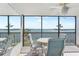 Lanai with waterfront views offers an outdoor dining area at 8911 Midnight Pass Rd # 308, Sarasota, FL 34242