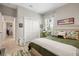 Cozy bedroom with a spacious closet, comfortable bed, and natural light at 9012 Province St, Sarasota, FL 34240