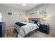 Nautical themed bedroom with a comfortable bed, stylish decor, and ample natural light at 9012 Province St, Sarasota, FL 34240