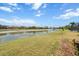 Peaceful pond view with verdant lawns at 9012 Province St, Sarasota, FL 34240