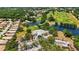 Aerial view of the River Club Golf and Country Club facility and surrounding golf course and lakes at 9915 Old Hyde Park Pl, Bradenton, FL 34202