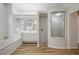 Bathroom featuring a tub, shower, vanity, and ample space at 9915 Old Hyde Park Pl, Bradenton, FL 34202