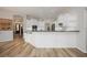 Bright kitchen with stainless steel appliances, white cabinets, and lots of countertop space at 9915 Old Hyde Park Pl, Bradenton, FL 34202