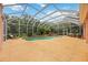 Backyard pool area featuring lush tropical landscaping and an inviting outdoor living space at 9915 Old Hyde Park Pl, Bradenton, FL 34202