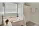 Relaxing bathroom featuring a large soaking tub and separate shower, designed for ultimate comfort and relaxation at 11 Lateen Sail Dr, Placida, FL 33946