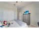 Comfortable bedroom with a double door closet, and a TV, offering ample storage and entertainment options at 11 Lateen Sail Dr, Placida, FL 33946