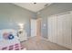 Calm bedroom with a double door closet, a nightstand, and comfortable bed, offering a cozy and organized space at 11 Lateen Sail Dr, Placida, FL 33946