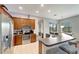Modern kitchen with stainless steel appliances, ample counter space, and a cozy breakfast bar seating area at 11 Lateen Sail Dr, Placida, FL 33946