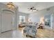 Cozy living room with bright natural light, stylish decor, and open entryways that create an inviting atmosphere at 11 Lateen Sail Dr, Placida, FL 33946