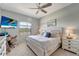 Cozy bedroom featuring a queen-sized bed, stylish nightstands, and serene decor with a calming coastal theme at 11 Lateen Sail Dr, Placida, FL 33946